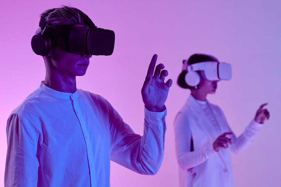 Two people engage in a futuristic virtual reality simulation with headsets and vibrant lighting
